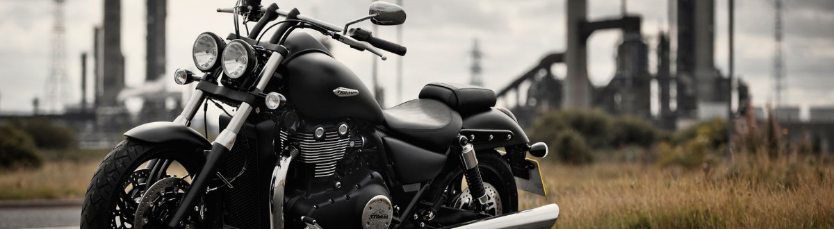 Triumph bike. Beautiful black Triumph bike parked on the road. Of Xtreme Machines at 700 Hwy 33.